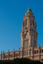 Old clock tower in the center of Porto in sunset rays