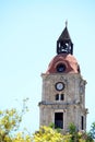 Old clock tower in Rhodes City Greece Royalty Free Stock Photo