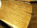 Old closed the book with a damaged cover. Royalty Free Stock Photo