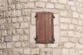 Old closed wooden window. Window in the old fortress Royalty Free Stock Photo