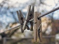 Old clothespins on clothesline close-up Royalty Free Stock Photo
