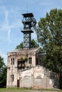 Old coal mine shaft with a mining tower Royalty Free Stock Photo