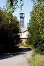 Old coal mine shaft with a mining tower Royalty Free Stock Photo