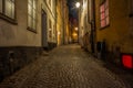 Old cobbled colorful  narrow street in Stockholm at night - 5 Royalty Free Stock Photo