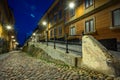 Old cobbled colorful  narrow street in Stockholm at night - 3 Royalty Free Stock Photo