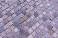 Old cobblestone pavement close-up background and texture Royalty Free Stock Photo