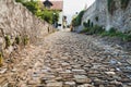 Old cobblestone street in Aigle, Switzerland Royalty Free Stock Photo