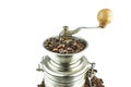 Old Coffee Grinder with Coffee beans, isolated on white Royalty Free Stock Photo