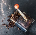 Old coffee grinder on black table Royalty Free Stock Photo