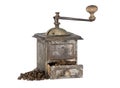Old coffee grinder with coffee beans isolated Royalty Free Stock Photo