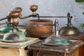 Old coffee grinders on concrete background Royalty Free Stock Photo