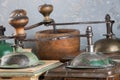 Old coffee grinders on concrete background Royalty Free Stock Photo