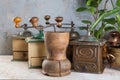 Old coffee grinders on concrete background Royalty Free Stock Photo