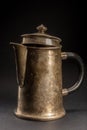 Old coffee pot on dark  background. Vintage teapot Royalty Free Stock Photo