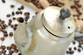 Old coffee pot spilled and spilled coffee beans Royalty Free Stock Photo