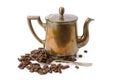 Old coffee pot, spoon and coffee beans on white backgro Royalty Free Stock Photo