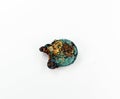 Old coin from the bottom of the sea, oxides, patina, rust, outgrowths of an unusual shape,