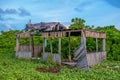 Old collapsed wooden house at the tropical island Royalty Free Stock Photo