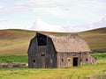 Old collapsing wooden barn Royalty Free Stock Photo