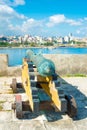 Old colonial spanish cannon aiming at the city of Havana Royalty Free Stock Photo