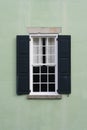 Old colonial window with shutters