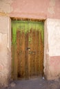 Old colonial wooden door in Potosi State, Bolivia. Royalty Free Stock Photo