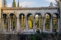 Old colonnade in an abandoned palace. Former sanatorium Medea in Tskaltubo Royalty Free Stock Photo
