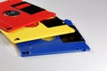 Old color floppy disk. Red, yellow and blue. Royalty Free Stock Photo