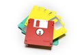 Old colored computer floppy disks on white background. Royalty Free Stock Photo