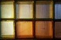 Old colored glass blocks with penetrating light, instead of a window Royalty Free Stock Photo