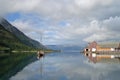 Old colored houses and boat in Mosjoen, Norway Royalty Free Stock Photo