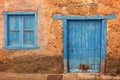 Old colored windows and doors, from typical village of Spain Royalty Free Stock Photo