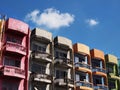Old colorful apartment buildings and blue sky background Royalty Free Stock Photo