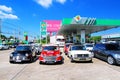Old Colorful Austin Mini cooper car parking in gas station Royalty Free Stock Photo