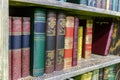 Library a number of old books on the bookshelf in a row Royalty Free Stock Photo