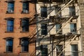 Old Colorful Brick Buildings with a Fire Escape in Chelsea of New York City Royalty Free Stock Photo