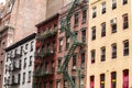 Old colorful buildings with fire escape,NYC, USA