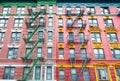 Old colorful buildings with fire escapes, New York City, USA Royalty Free Stock Photo