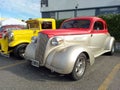 old colorful 1937 Chevrolet Master coupe street rod in a parking lot. Classic car show. Royalty Free Stock Photo