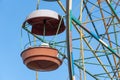 Old colorful ferris wheel in amusement park. Multicolour soviet carousel. Royalty Free Stock Photo