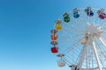 Old colorful ferris wheel on background of blue sky Royalty Free Stock Photo