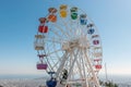 Old colorful ferris wheel on background of blue sky Royalty Free Stock Photo