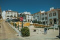 Old colorful houses around square and pedestrian