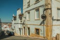 Old colorful houses with peeling plaster wall in a deserted alley Royalty Free Stock Photo