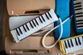 Old colorful Melodion with plastic hard case Royalty Free Stock Photo