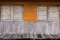 old colorful moldy wood wall and musty wood window, break and be