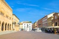 Old colorful multicolored building and houses and Pope Paul V monument on Piazza Cavour square in historical touristic city Rimini