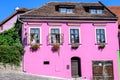 Old colorful painted house in the historical center of the Sighisoara citadel, in Transylvania Transilvania region of Romania, Royalty Free Stock Photo
