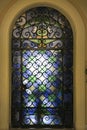 Old colorful stained glass door with wrought iron details Royalty Free Stock Photo