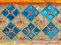 Old colorful tiles decorated on the wall.
